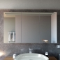 Preview: Badspiegelschrank mit LED Beleuchtung KOPERVIK, von vorne und unbeleuchtet beleuchtet